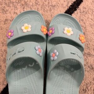 CROCS women’s size 9 
Light Blue Double Band Slide Sandals with Flower Charms